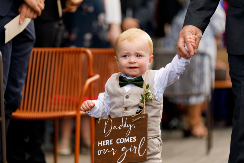 "Daddy - here comes our girl"